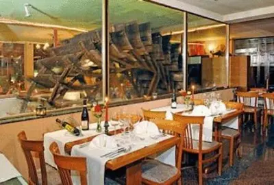 Ein Restaurant oder anderes Speiselokal in der Unterkunft L´Antica Ruota - Zum Alten Wasserrad