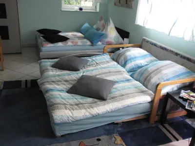 Ein Bett oder Betten in einem Zimmer der Unterkunft Gästezimmer in Aspach