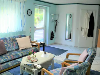 Ein Sitzbereich in der Unterkunft Gästezimmer in Aspach