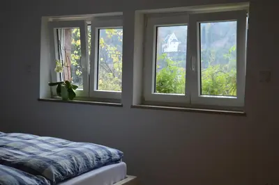 Ein Bett oder Betten in einem Zimmer der Unterkunft Panorama-Blick Miltenberg, 3 Pers., zentr., am Main, Terrasse, Bootverleih, P