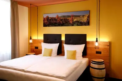 Ein Bett oder Betten in einem Zimmer der Unterkunft Casa Palatina Vinotel