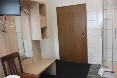 Ein Badezimmer in der Unterkunft Airport-Hotel zum Taubengrund