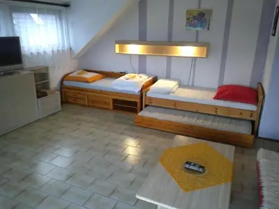 Ein Bett oder Betten in einem Zimmer der Unterkunft Bea's Monteurzimmer