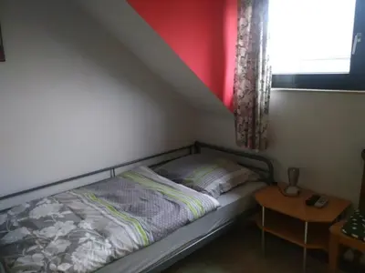 Ein Bett oder Betten in einem Zimmer der Unterkunft Bea's Monteurzimmer