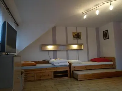 Ein Bett oder Betten in einem Zimmer der Unterkunft Bea's Monteurzimmer