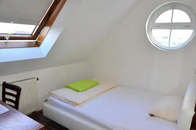 Ein Bett oder Betten in einem Zimmer der Unterkunft Hotel Mörike