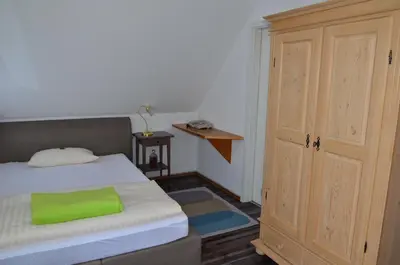 Ein Bett oder Betten in einem Zimmer der Unterkunft Hotel Mörike