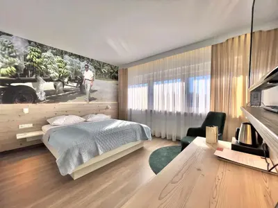 Ein Bett oder Betten in einem Zimmer der Unterkunft ART-Hotel Braun