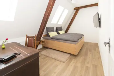 Ein Bett oder Betten in einem Zimmer der Unterkunft Altes Amtsgericht Oppenheim