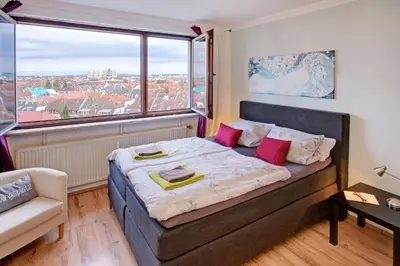 Ein Bett oder Betten in einem Zimmer der Unterkunft Blick über Karlsruhe - Ferienwohnung Panorama