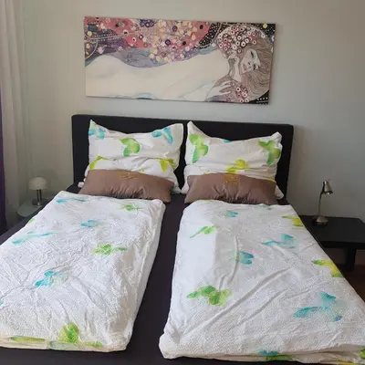 Ein Bett oder Betten in einem Zimmer der Unterkunft Blick über Karlsruhe - Ferienwohnung Panorama