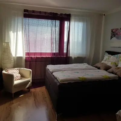 Ein Bett oder Betten in einem Zimmer der Unterkunft Blick über Karlsruhe - Ferienwohnung Panorama