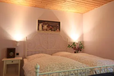 Ein Bett oder Betten in einem Zimmer der Unterkunft Hotel Weingewolbe