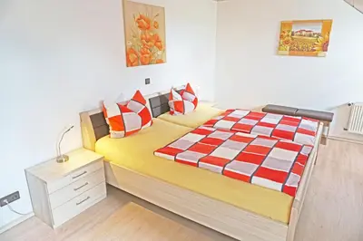 Ein Bett oder Betten in einem Zimmer der Unterkunft Winzerhof Spengler