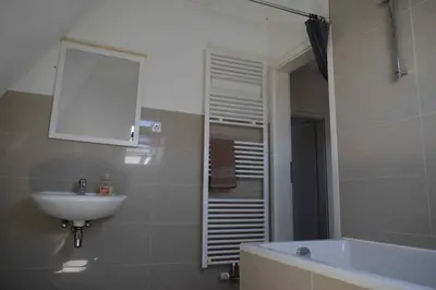 Ein Badezimmer in der Unterkunft Ferienwohnung Gruppenhaus bis 12 Personen