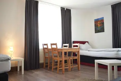 Ein Sitzbereich in der Unterkunft Ferienwohnung Gruppenhaus bis 12 Personen