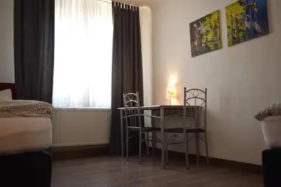 Ein Bett oder Betten in einem Zimmer der Unterkunft Ferienwohnung Gruppenhaus bis 12 Personen