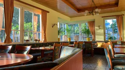 Ein Sitzbereich in der Unterkunft Hotel Schillerplatz