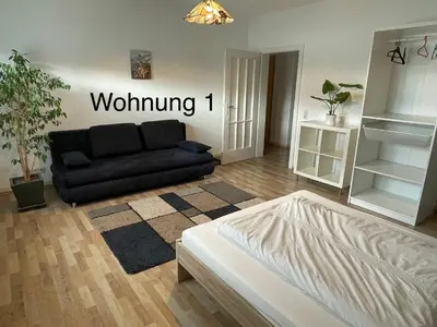 Ein Bett oder Betten in einem Zimmer der Unterkunft Ferienwohung Weinheim