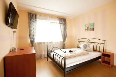 Ein Bett oder Betten in einem Zimmer der Unterkunft Hotel Jasmin