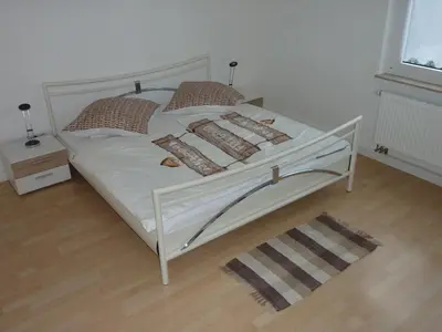 Ein Bett oder Betten in einem Zimmer der Unterkunft Ferienwohnung Landwehr