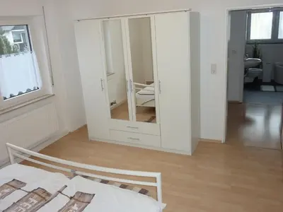 Ein Bett oder Betten in einem Zimmer der Unterkunft Ferienwohnung Landwehr