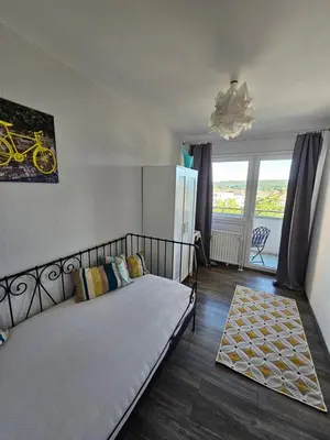 Ein Bett oder Betten in einem Zimmer der Unterkunft Deluxapartment