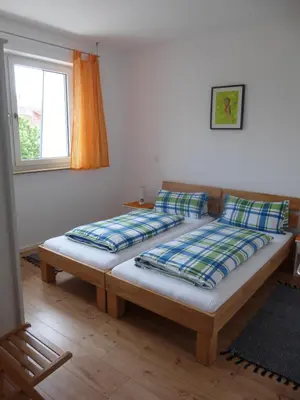 Ein Bett oder Betten in einem Zimmer der Unterkunft Fewo Max und Moritz