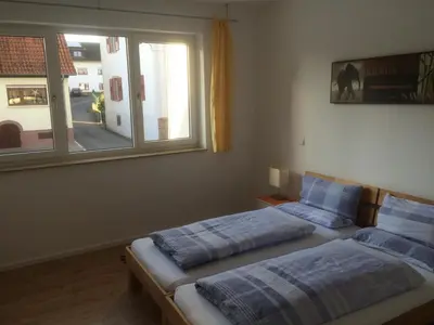 Ein Bett oder Betten in einem Zimmer der Unterkunft Fewo Max und Moritz
