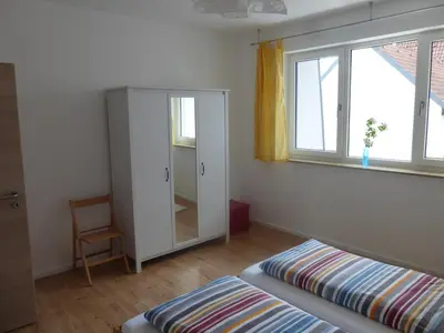 Ein Bett oder Betten in einem Zimmer der Unterkunft Fewo Max und Moritz