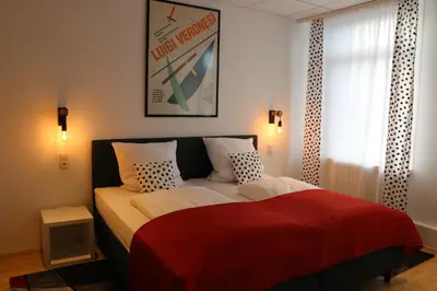 Ein Bett oder Betten in einem Zimmer der Unterkunft Casa Hotel Neu-Isenburg
