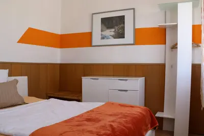 Ein Bett oder Betten in einem Zimmer der Unterkunft Casa Hotel Neu-Isenburg