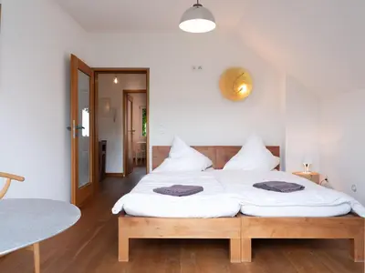 Ein Bett oder Betten in einem Zimmer der Unterkunft Gruppenhaus Darmstadt