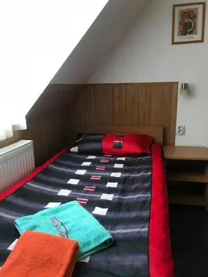 Ein Bett oder Betten in einem Zimmer der Unterkunft Pension Haus Baron 1 Neckarau