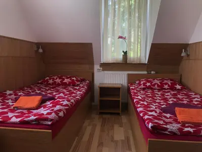 Ein Bett oder Betten in einem Zimmer der Unterkunft Pension Haus Baron 1 Neckarau