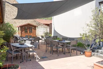 Ein Restaurant oder anderes Speiselokal in der Unterkunft Weingut und Gästehaus Wetzler