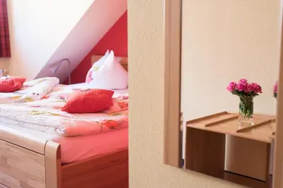 Ein Bett oder Betten in einem Zimmer der Unterkunft Weingut und Gästehaus Wetzler