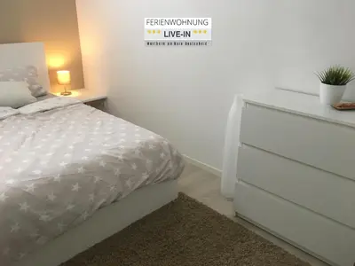 Ein Bett oder Betten in einem Zimmer der Unterkunft Tiny Apartment LIVE-IN Wertheim am Main