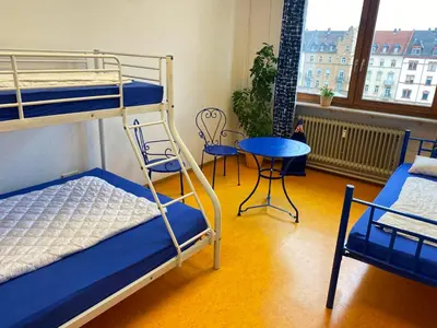 Ein Bett oder Betten in einem Zimmer der Unterkunft Steffis Hostel Heidelberg