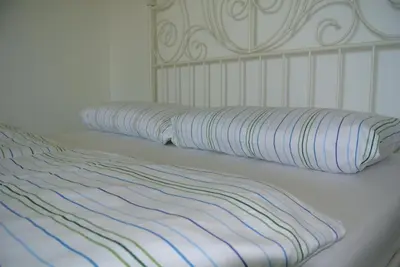 Ein Bett oder Betten in einem Zimmer der Unterkunft Steffis Hostel Heidelberg