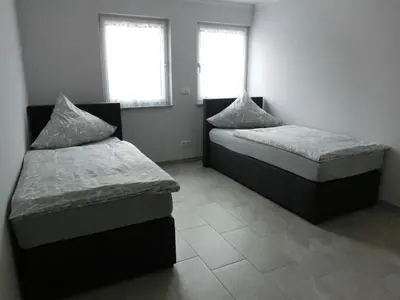 Ein Bett oder Betten in einem Zimmer der Unterkunft Zimmer Enzjan