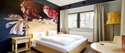 Ein Bett oder Betten in einem Zimmer der Unterkunft Walk'sches Haus