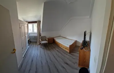 Ein Bett oder Betten in einem Zimmer der Unterkunft Hotel Platzhirsch