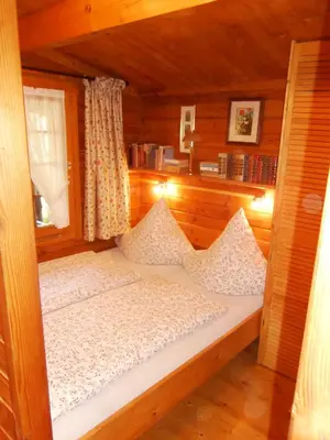 Ein Bett oder Betten in einem Zimmer der Unterkunft Ferienhütte Stephanie