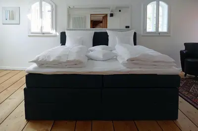 Ein Bett oder Betten in einem Zimmer der Unterkunft Fachwerkhaus Maximilian