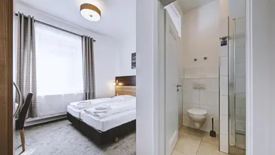 Ein Badezimmer in der Unterkunft Boutique-Hotel Kronenstuben - unschlagbare Zentrumsnähe direkt am Marstall & Marktplatz - Schloss in 3 Min - Frühstück - Langzeitmiete