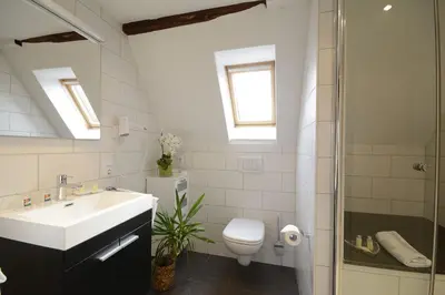 Ein Badezimmer in der Unterkunft Haus am Heiner Geißler Platz by Landgasthof Zickler