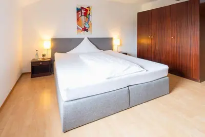 Ein Bett oder Betten in einem Zimmer der Unterkunft Hotel Landgasthaus Sockenbacher Hof