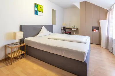 Ein Bett oder Betten in einem Zimmer der Unterkunft Hotel Landgasthaus Sockenbacher Hof