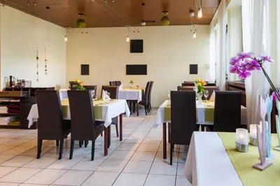 Ein Restaurant oder anderes Speiselokal in der Unterkunft Hotel Landgasthaus Sockenbacher Hof